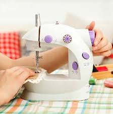 Hand held sewing machines