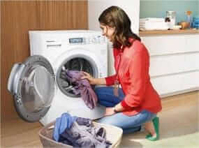 how place clothes in front load washing machine